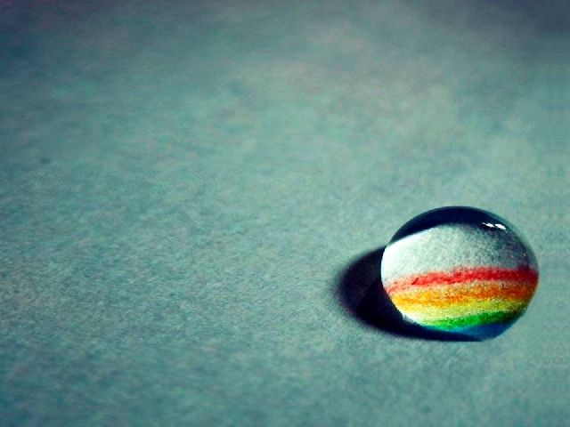 Rainbow in water drops PowerPoint bac
